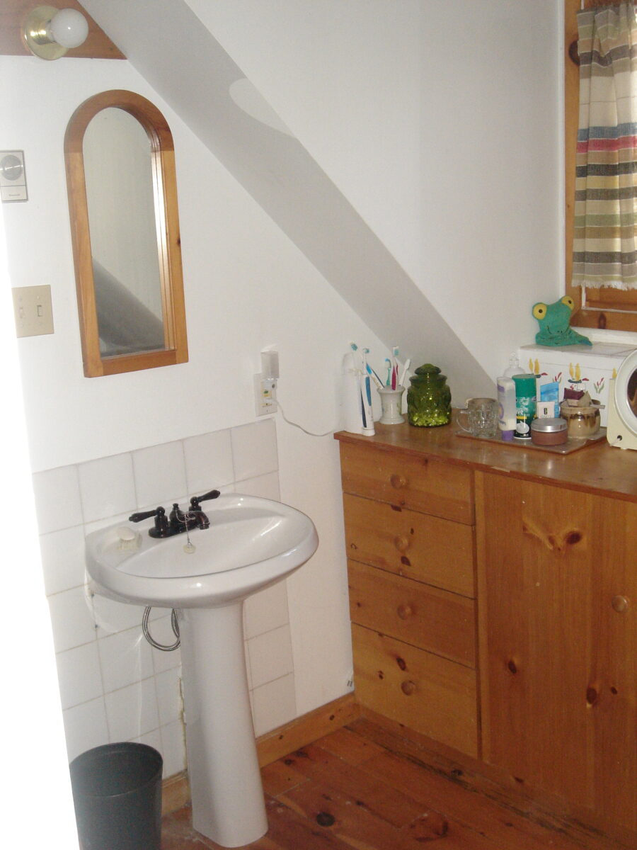 Upstairs full bathroom sink and cupboard